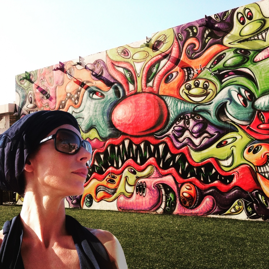 Facing the faces on the face (Art by Kenny Scharf)